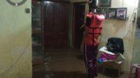 Banjir yang merendam salah satu Rumah warga di wilayah Kabupaten Jember