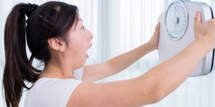 Ilustrasi gambar timbangan berat badan