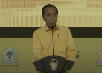 Misteri Dibalik Kemeja Kuning Jokowi di Munas Golkar