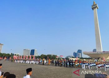 Semangat Patriotisme Menggema di Monas, Kibaran Merah Putih Mengiringi Drumband yang Bergemuruh