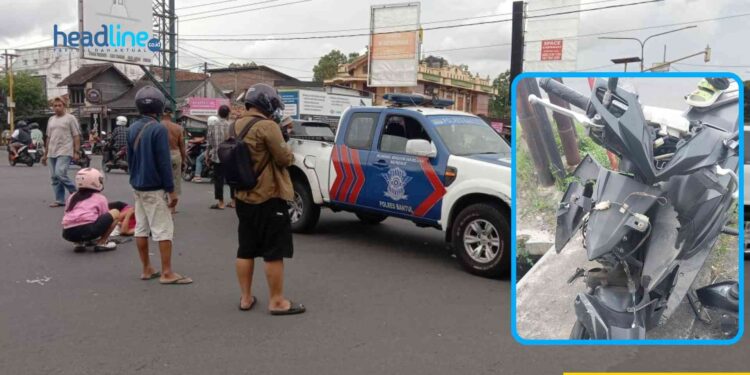 Petugas Kepolisian Sedang melakukan Kecelakaan Mobil Vs Motor di Perempatan Wojo Bantul