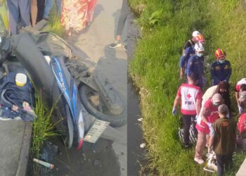 Petugas Gabungan sedang melakukan evakuasi korban terpental di Sungai korban kecelakaan di Jembatan Plakaran