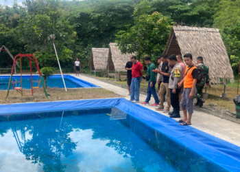 Petugas TNI dan Polri Melihat lokasi Balita Tengelam di Banguntapan Bantul