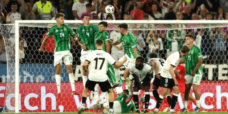 Gelandang Timnas Jerman Florian Wirtz (17) mencetak gol tendangan bebas ke gawang Timnas Irlandia Utara