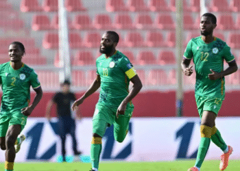 Penyerang Timnas Komoros Youssouf M'Changama (10) merayakan keberhasilannya mencetak gol ke gawang Timnas Afrika Tengah