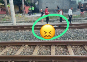 Warga dan petugas terlihat di lokasi kejadian di jalur KM 151+23 Brambanan–Maguwo