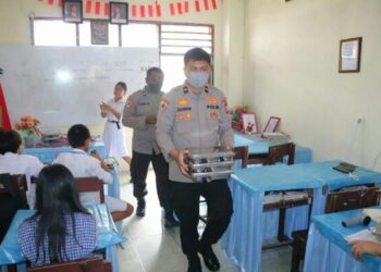 Polda Sulut Distribusikan 1.086 Porsi Makanan Bergizi ke 12 Sekolah di Manado