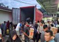 Polres Langkat Distribusikan Bantuan untuk Korban Banjir di Paya Bengkuang