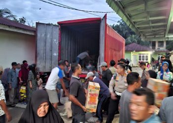 Polres Langkat Distribusikan Bantuan untuk Korban Banjir di Paya Bengkuang