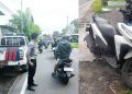Petugas kepolisian melakukan pengamanan dan pengaturan lalu lintas di lokasi kejadian kecelakaan sepeda motor guna memastikan arus kendaraan tetap lancar dan aman