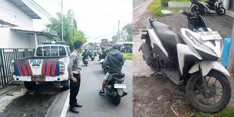 Petugas kepolisian melakukan pengamanan dan pengaturan lalu lintas di lokasi kejadian kecelakaan sepeda motor guna memastikan arus kendaraan tetap lancar dan aman