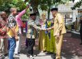 Menteri HAM Natalius Pigai Disambut Upacara Adat di Gorontalo