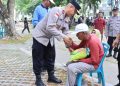 Polda Aceh Bagikan 2,5 Ton Beras pada Peringatan May Day