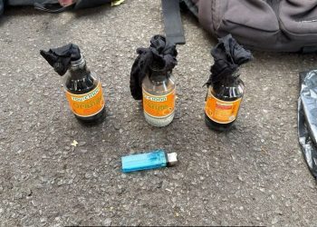 Pria Bawa Botol Bersumbu di Aksi Unjuk Rasa Ditetapkan Sebagai Tersangka