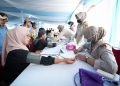 Bakti Sosial HUT Bhayangkara ke-80: Warga Bekasi Terima Pemeriksaan Kesehatan dan Sembako