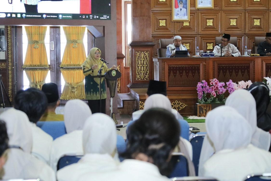 : Bupati Siak Afni Zulkifli saat menjadi keynote Speech pada seminar internasional/ MC Siak.
