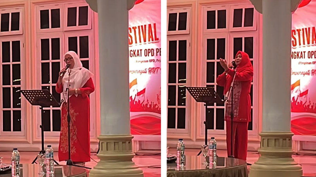 : Penampilan dua pejabat Dinas Arpus dalam Festival Lagu Perjuangan yang digelar di rumah dinas wakil Gubernur Gorontalo. (foto PPID)