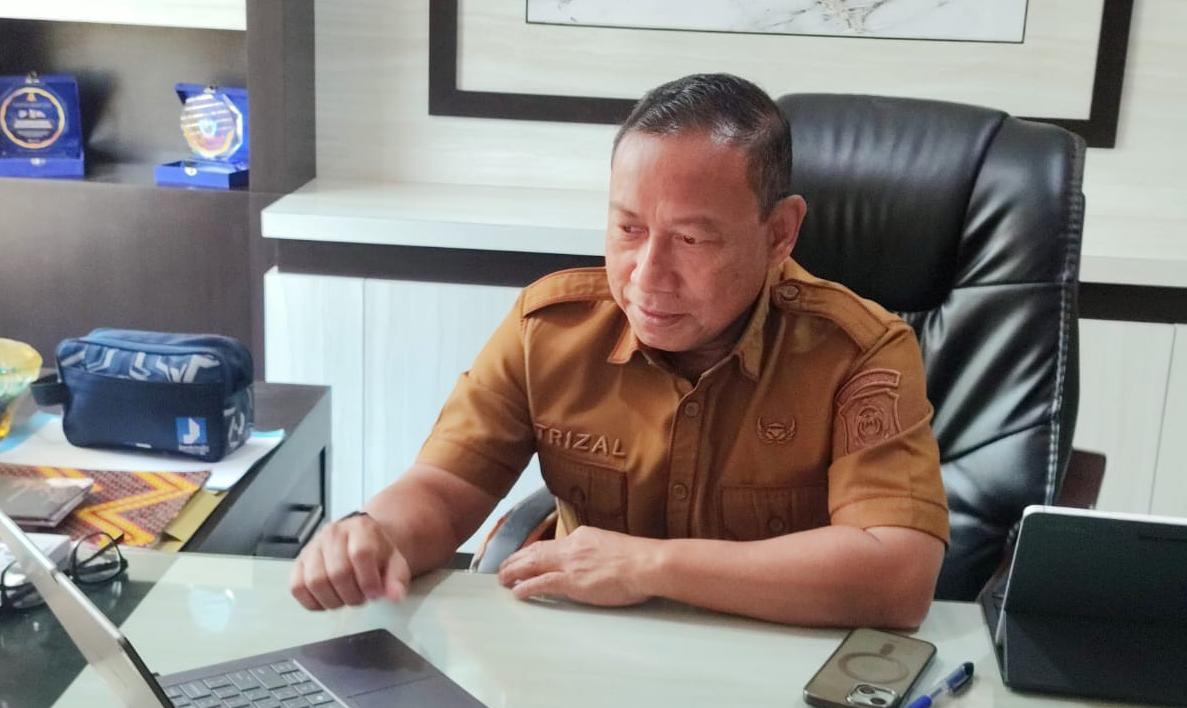 : Kepala Dinas Informatika dan Statistik Provinsi Gorontalo Mohamad Trizal Entengo menandatangani Perjanjian Kerja Sama (PKS) antara Pemerintah Provinsi Gorontalo dan Balai Besar Sertifikasi Elektronik (BSrE) Badan Siber dan Sandi Negara (BSSN), Senin (24/8/2026).