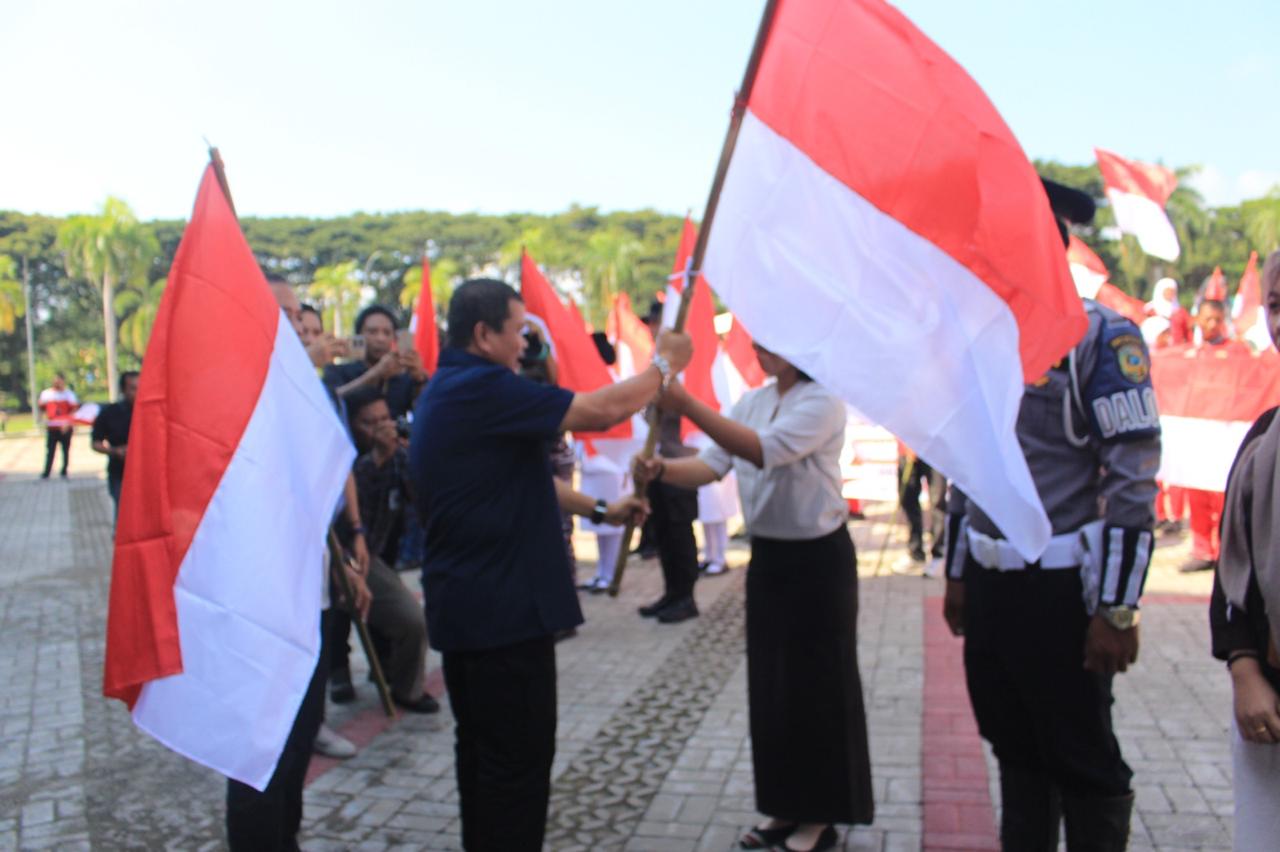 : Pemkab Parigi Moutong mencanangkan Gerakan Pembagian Bendera Merah Putih menyambut HUT ke-81 RI, Selasa (11/8/2026).
