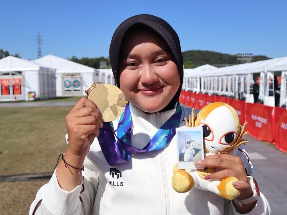 : Atlet panahan Indonesia Nurisa Dian Ashrifah mencetak sejarah pada Asian Games Aichi-Nagoya 2026 setelah mempersembahkan medali emas dari nomor Compound Women Individual. (Foto: Humas Kemenpora)